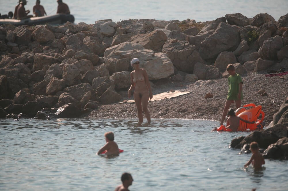 FKK cove pyramid in waters - Types of recreation in nudist destinations