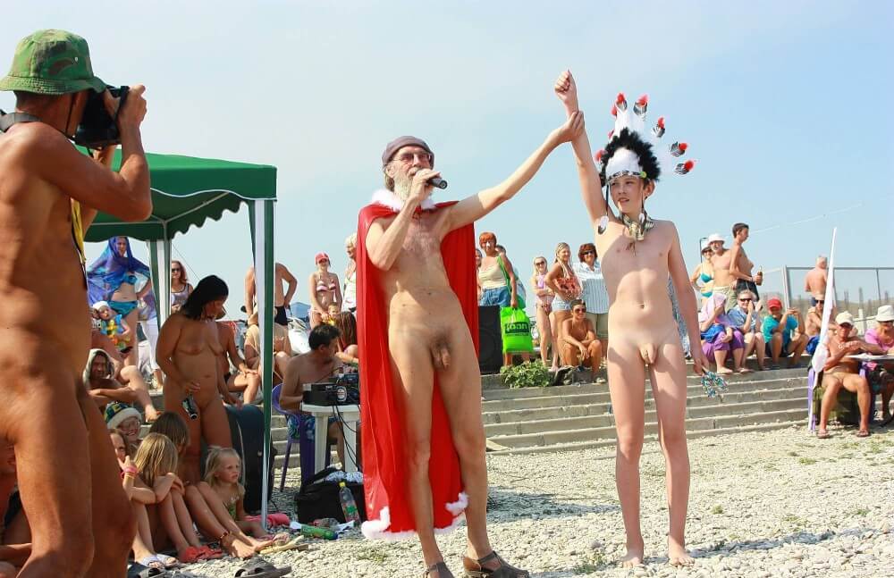 Native Headdress Dance pics - Popularizing nudism among the general public