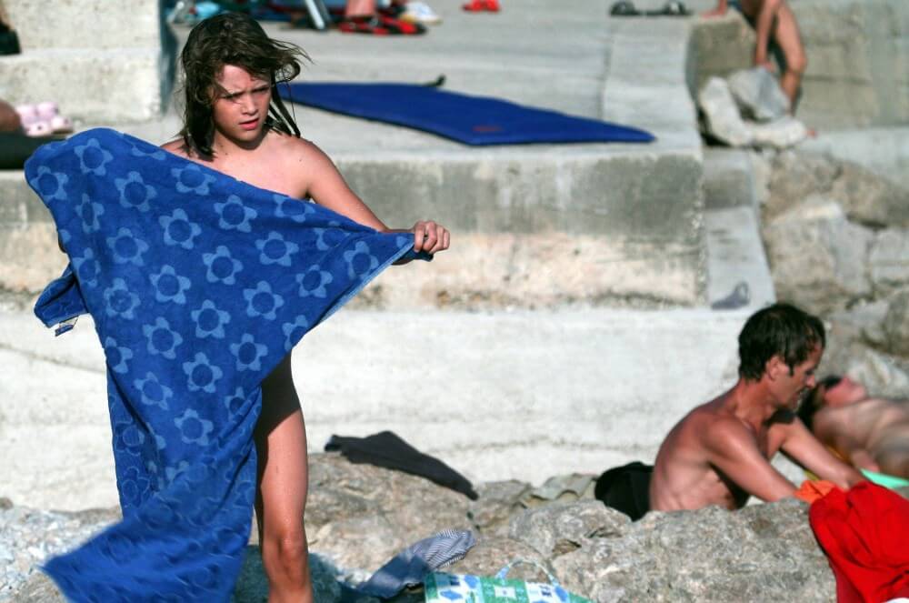 Nudist Rocky Family Angle - Nudism and naturism promote respect for natural beauty and diversity
