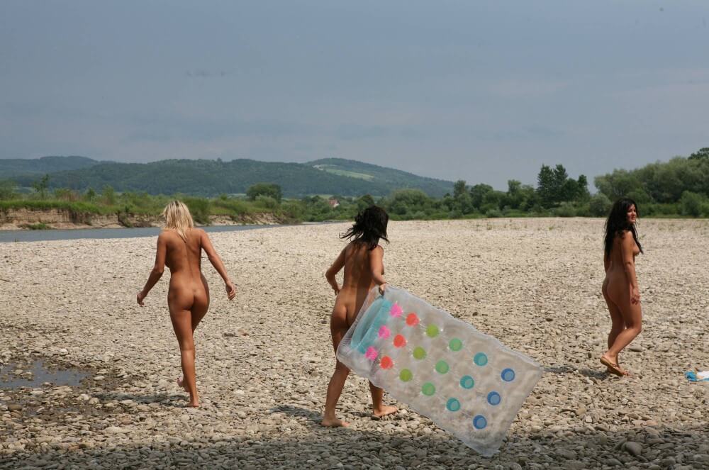 Naturist Park Floating On River photos - Getting rid of clothes