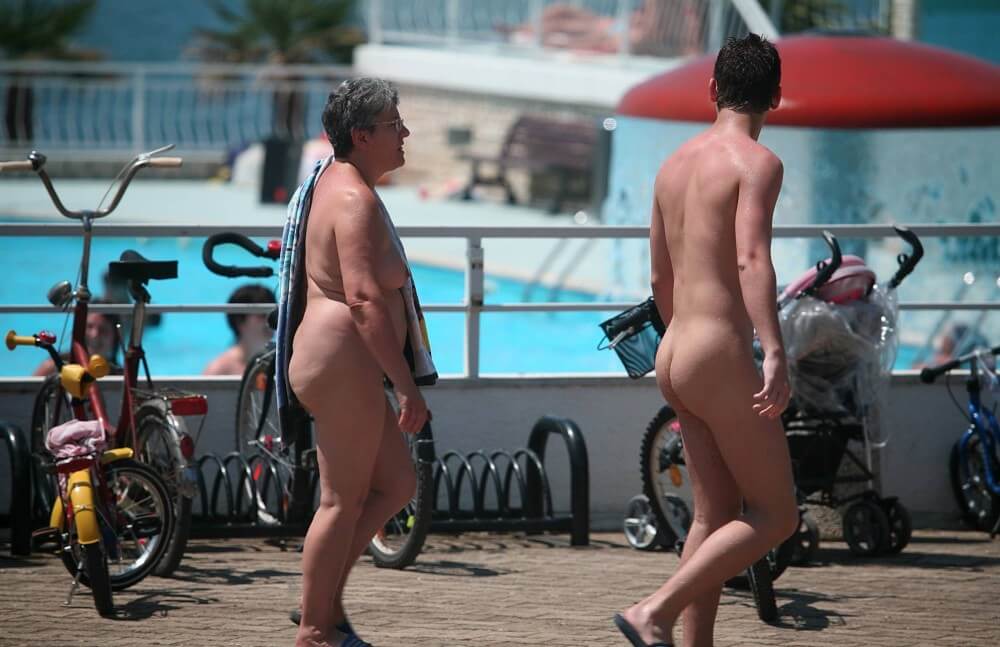 Sun-Soaked Sidewalk pics - The practice of nudism helps overcome insecurities and overcome fears
