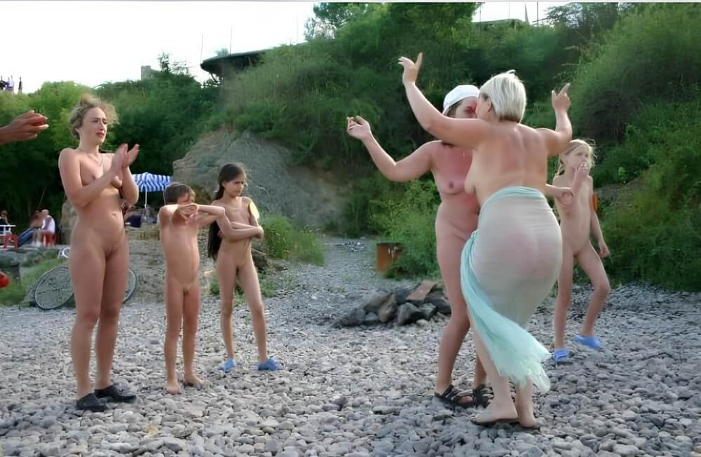 Dances on a beach pics - Nudism brings joy to life