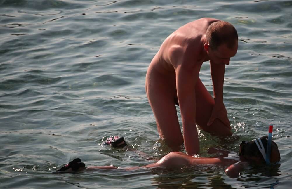 Father Floats His Daughter pics - Living in harmony with nature as the primary goal of the naturist lifestyle