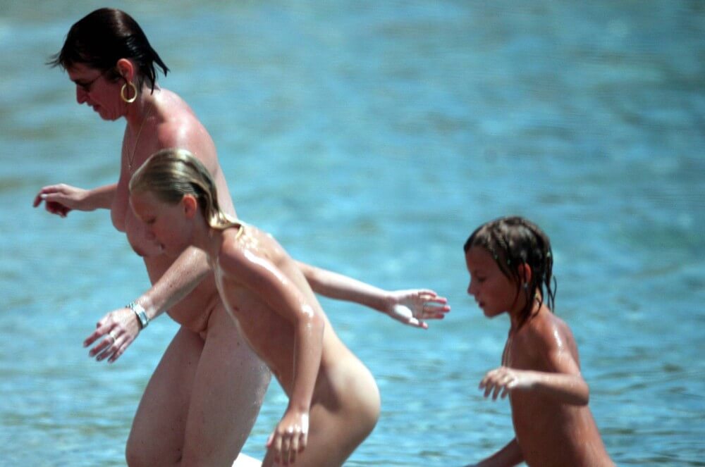 Running From the Waters pics - Nudity is a natural part of life for some people on the planet